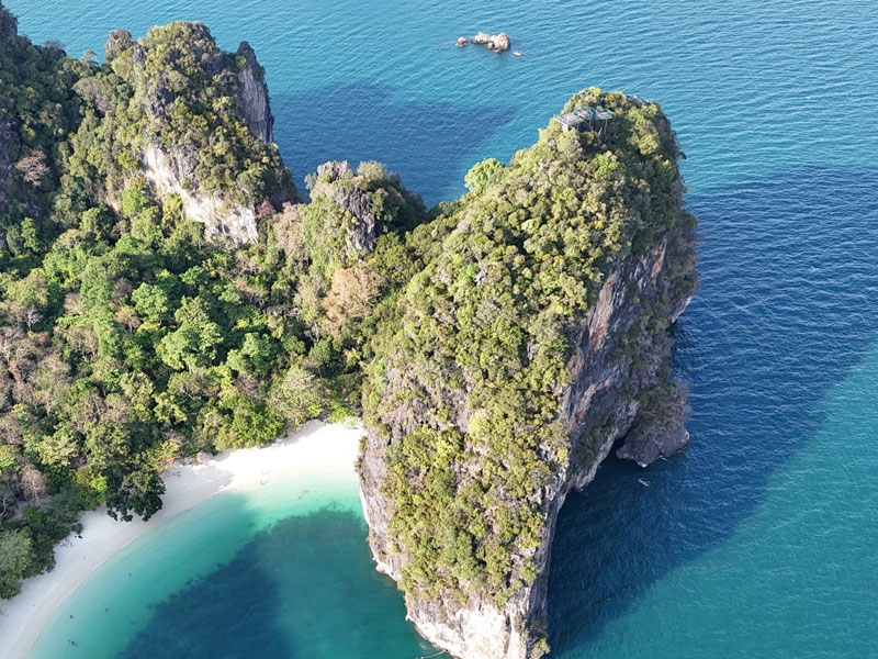 The metal staircase climbing through the trees up to the Koh Hong 360 viewpoint