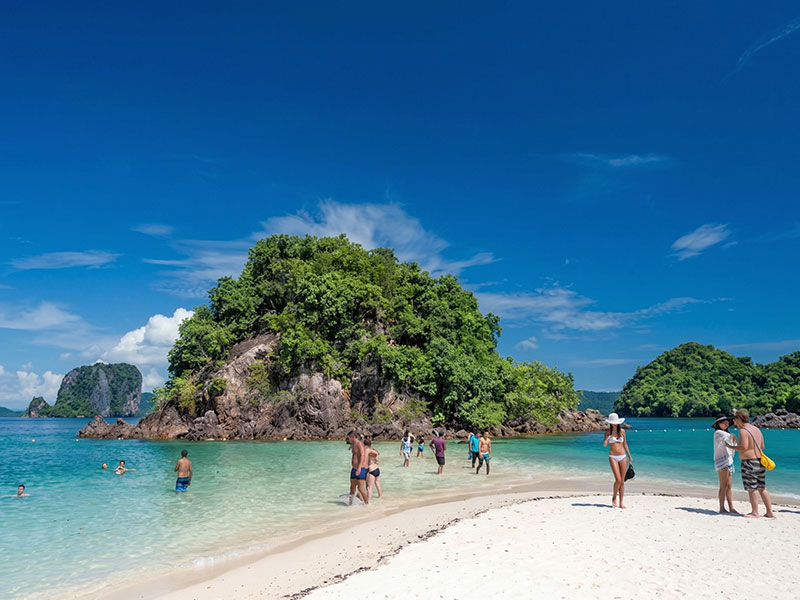 Snorkeling over the shallow reef at the northern tip of Koh Pakbia